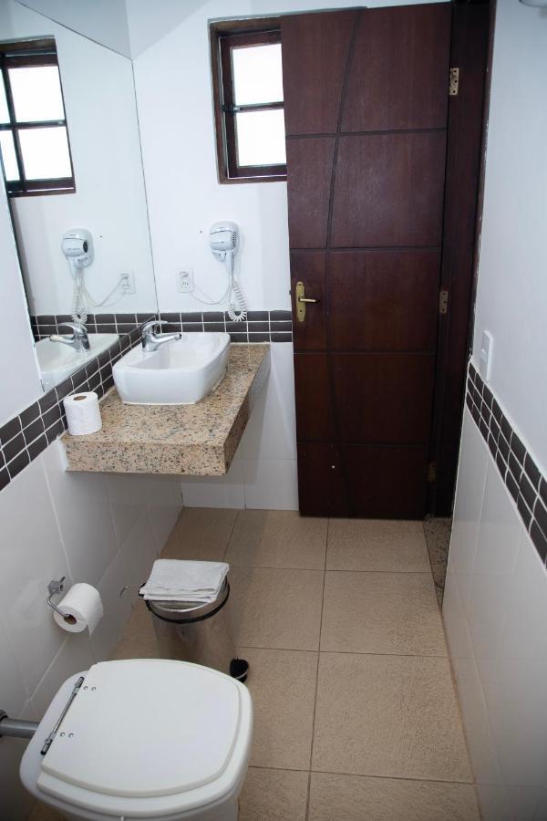 Quarto Quádruplo com Banheiro Privativo