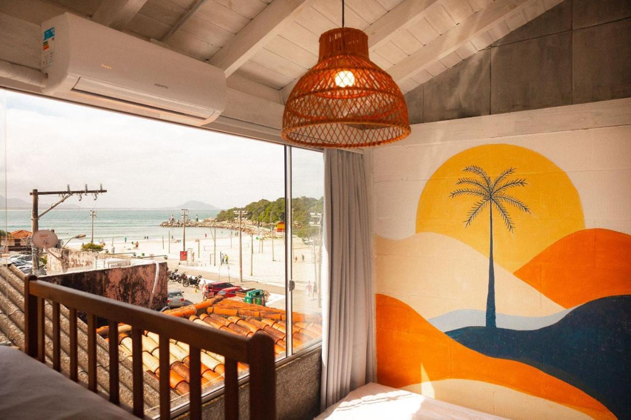 Quarto Quádruplo com Vista do Mar.
