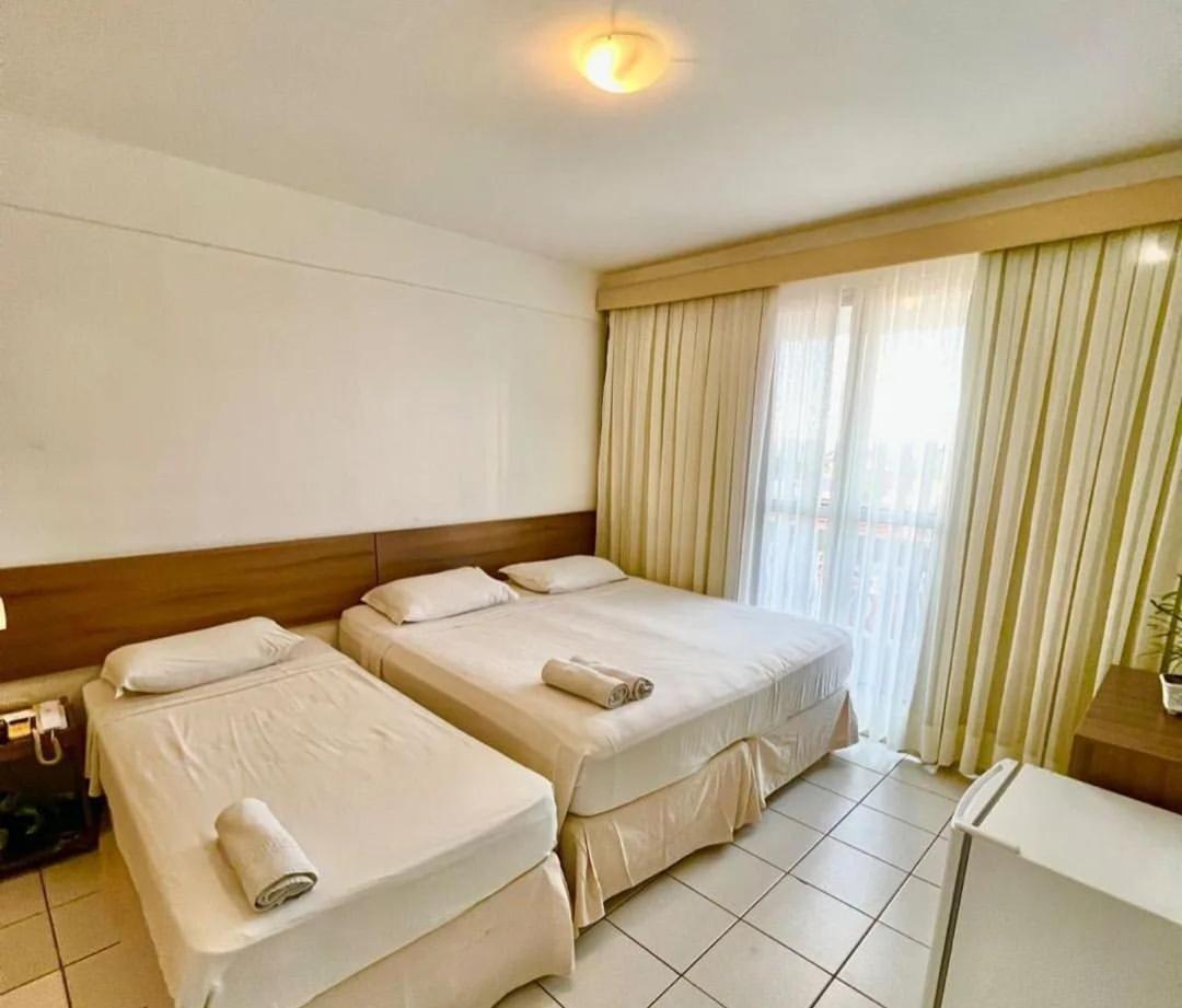 Quarto Triplo com Varanda