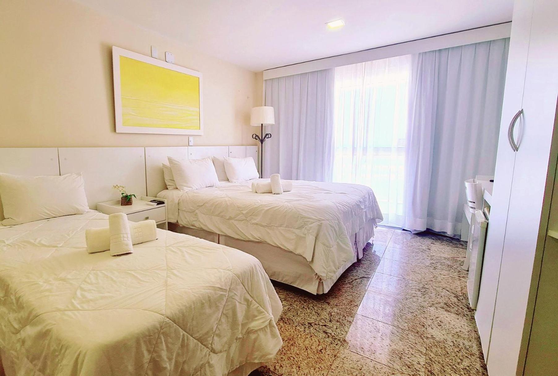 Quarto Triplo Standard com Vista Lateral do Mar