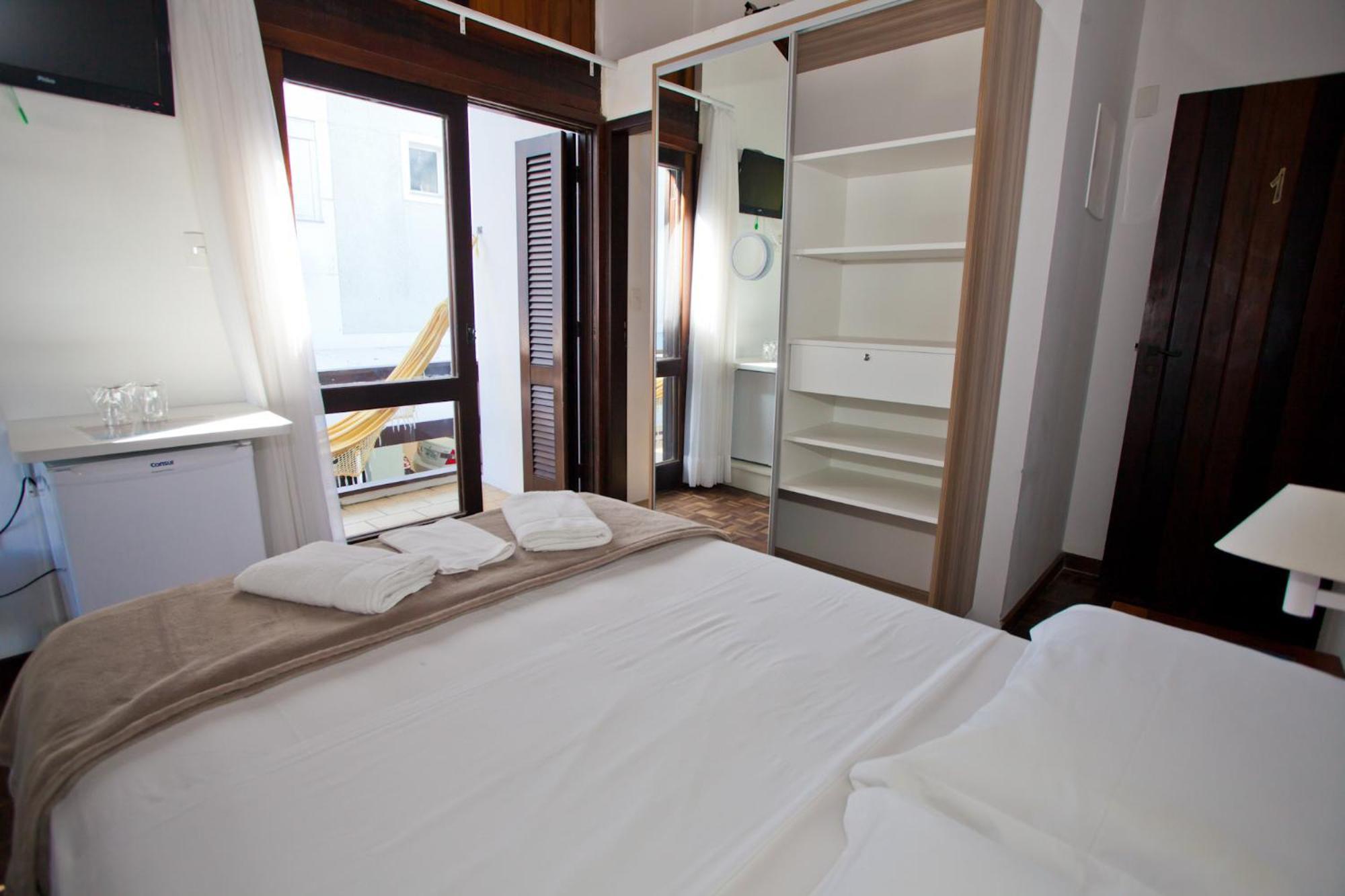 Quarto Quádruplo com Varanda