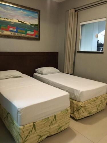 Quarto com 2 Camas de Solteiro