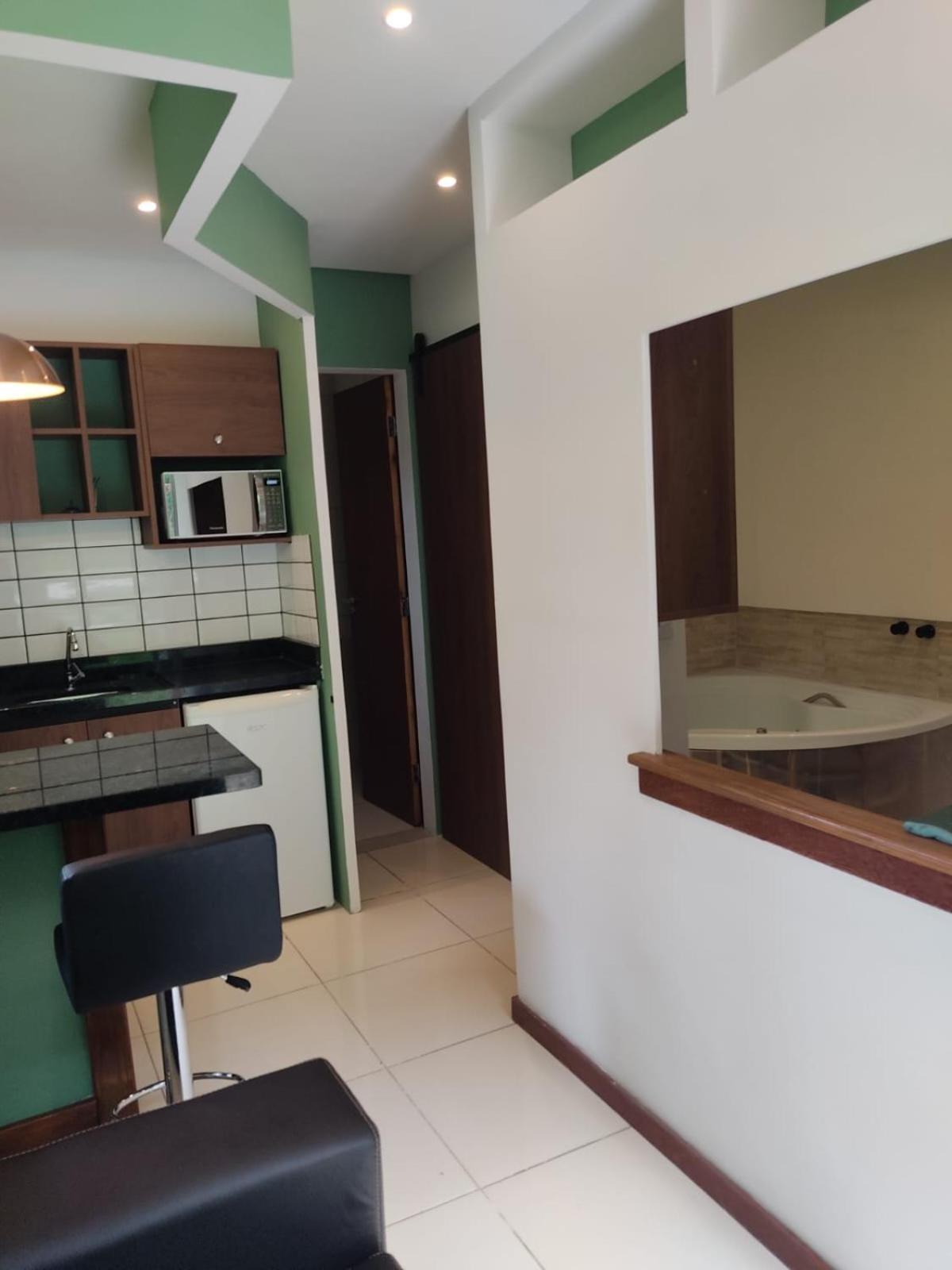 Estúdio com Banheira de Hidromassagem