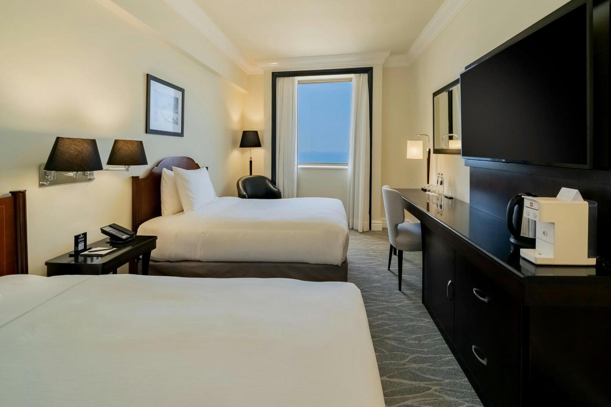 Quarto com 2 Camas de Solteiro e Acesso ao Lounge Executivo