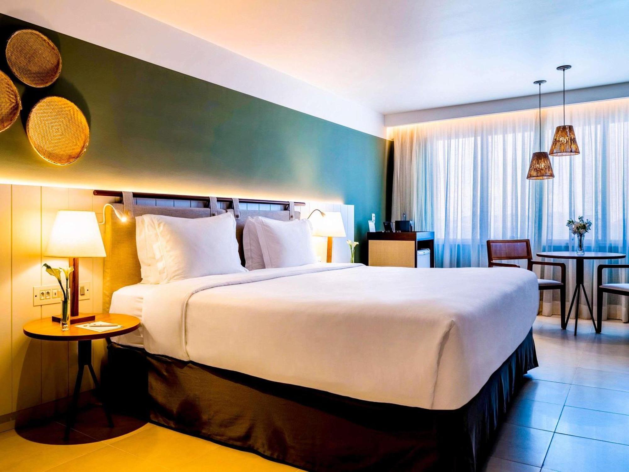 Quarto Deluxe com Cama King-size e Vista da Cidade