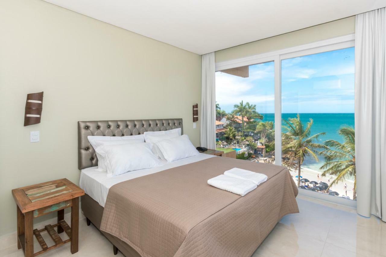 Quarto Quádruplo com Vista do Mar.