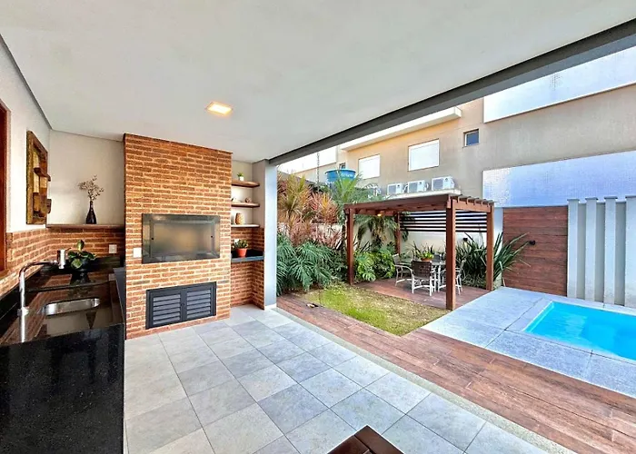 192 - Casa luxo com 5 suítes e piscina aquecida Bombinhas